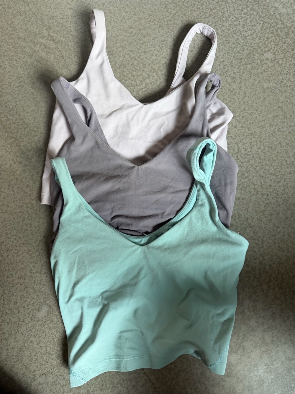 3 lululemon athletica V-Neck Camisole Set in light blue, purple, light pink